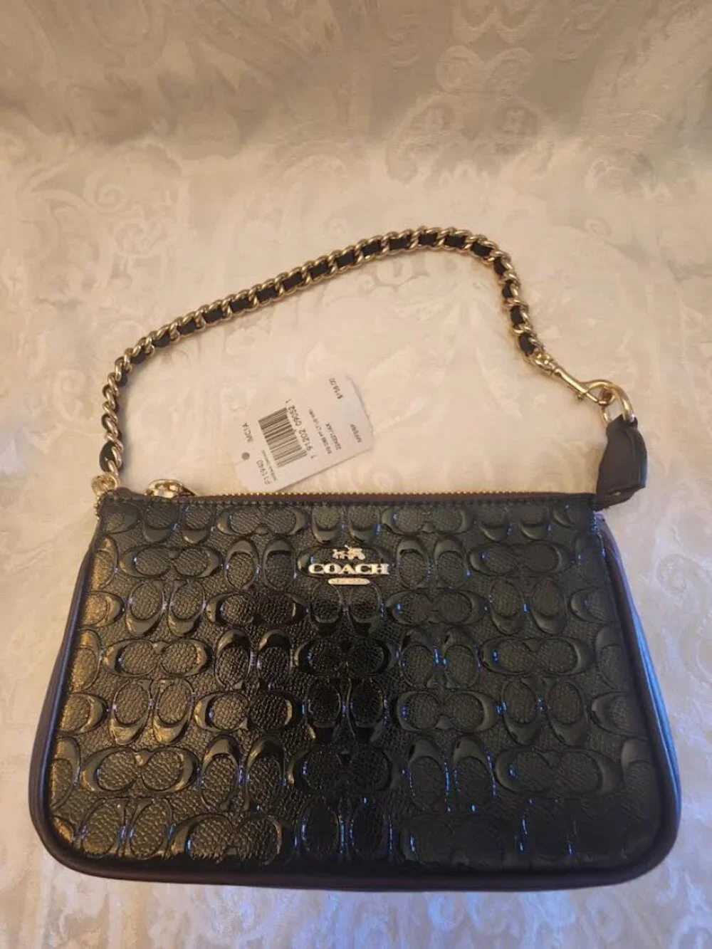 NWT COACH LARGE WRISTLET EMBOSSED BLK PATENT LEATHER TRIMED BRN LEATHER